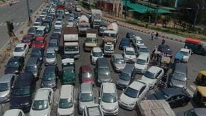 The officials of the NHAI said that the traffic jams were not due to construction work but due to barricading put up at the border area of NH-9. (Photo: Sakib Ali/HT) The officials of the NHAI said that the traffic jams were not due to construction work but due to barricading put up at the border area of NH-9. (Photo: Sakib Ali/HT)