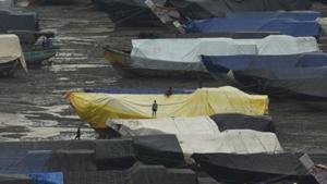 Fisherman parked their boats at the bay in Bhayandar as Cyclone NISARGA is about to hit the western shore in Mumbai(Hindustan Times) Fisherman parked their boats at the bay in Bhayandar as Cyclone NISARGA is about to hit the western shore in Mumbai(Hindustan Times)