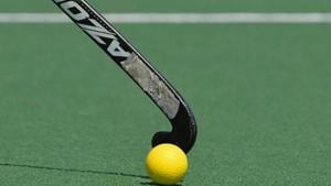 A field hockey stick hits the ball.(Getty Images) A field hockey stick hits the ball.(Getty Images)