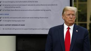 FILE - In this April 27, 2020, file photo, President Donald Trump listens during briefing about the coronavirus in the Rose Garden of the White House in Washington. For weeks, Trump has been eager to publicly turn the page on the coronavirus pandemic. But now the White House fears that the very thing that finally shoved the virus off centerstage — mass protests over the death of George Floyd — may bring about its resurgence. (AP Photo/Alex Brandon, File)(AP) FILE - In this April 27, 2020, file photo, President Donald Trump listens during briefing about the coronavirus in the Rose Garden of the White House in Washington. For weeks, Trump has been eager to publicly turn the page on the coronavirus pandemic. But now the White House fears that the very thing that finally shoved the virus off centerstage — mass protests over the death of George Floyd — may bring about its resurgence. (AP Photo/Alex Brandon, File)(AP)