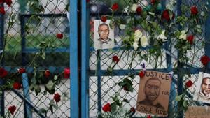 Pictures depicting George Floyd, who died in Minneapolis police custody, are seen next to messages, and flowers as a symbol of a protest against his killing, outside the US embassy in Mexico City.(REUTERS) Pictures depicting George Floyd, who died in Minneapolis police custody, are seen next to messages, and flowers as a symbol of a protest against his killing, outside the US embassy in Mexico City.(REUTERS)