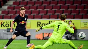 Soccer Football - Bundesliga - FC Cologne v RB Leipzig - RheinEnergieStadion, Cologne, Germany - June 1, 2020 RB Leipzig's Timo Werner scores their third goal, as play resumes behind closed doors following the outbreak of the coronavirus disease (COVID-19) Ina Fassbender/Pool via REUTERS(REUTERS) Soccer Football - Bundesliga - FC Cologne v RB Leipzig - RheinEnergieStadion, Cologne, Germany - June 1, 2020 RB Leipzig's Timo Werner scores their third goal, as play resumes behind closed doors following the outbreak of the coronavirus disease (COVID-19) Ina Fassbender/Pool via REUTERS(REUTERS)