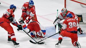 Kirill Semyonov of Russia, surrounded by Czech players Tomas Zohorna, Jakub Jerabek and Jakub Krejcik, falls in front of Czech goalkeeper Roman Will.(REUTERS) Kirill Semyonov of Russia, surrounded by Czech players Tomas Zohorna, Jakub Jerabek and Jakub Krejcik, falls in front of Czech goalkeeper Roman Will.(REUTERS)