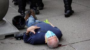 Martin Gugino, a 75-year-old protester, lays on the ground after he was shoved by two Buffalo, New York, police officers during a protest against the death in Minneapolis police custody of George Floyd in Niagara Square in Buffalo, New York.(via REUTERS) Martin Gugino, a 75-year-old protester, lays on the ground after he was shoved by two Buffalo, New York, police officers during a protest against the death in Minneapolis police custody of George Floyd in Niagara Square in Buffalo, New York.(via REUTERS)