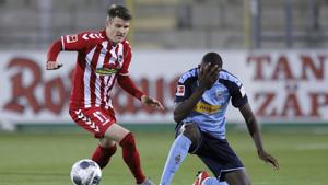 Freiburg's Lukas Kübler, left, and Mönchengladbach's Marcus Thuram challenge for the ball during the German Bundesliga soccer match between SC Freiburg and Borussia Moenchengladbach in Freiburg, Germany, June 5, 2020.(AP) Freiburg's Lukas Kübler, left, and Mönchengladbach's Marcus Thuram challenge for the ball during the German Bundesliga soccer match between SC Freiburg and Borussia Moenchengladbach in Freiburg, Germany, June 5, 2020.(AP)