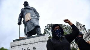 A demonstrator reacts infront of graffiti on a statue of Winston Churchill in Parliament Square during a Black Lives Matter protest in London, following the death of George Floyd who died in police custody in Minneapolis, London, Britain, June 7, 2020.(REUTERS) A demonstrator reacts infront of graffiti on a statue of Winston Churchill in Parliament Square during a Black Lives Matter protest in London, following the death of George Floyd who died in police custody in Minneapolis, London, Britain, June 7, 2020.(REUTERS)