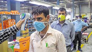 An acute shortage of workers has left industries struggling to pick up pace after government allowed resumption of business.(AFP Photo) An acute shortage of workers has left industries struggling to pick up pace after government allowed resumption of business.(AFP Photo)