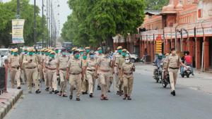 Police personnel conduct flag march in Jaipur. Rajasthan police arrested two civil defence employees on charges of espionage.(Himanshu Vyas / Hindustan Times/ For Representative Purposes Only) Police personnel conduct flag march in Jaipur. Rajasthan police arrested two civil defence employees on charges of espionage.(Himanshu Vyas / Hindustan Times/ For Representative Purposes Only)