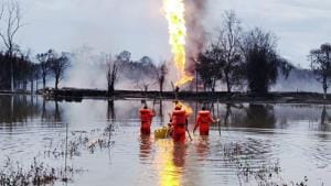 Smoke could be seen billowing from the well several kilometres away from the site close to Dibru Saikhowa National Park and the eco-sensitive Maguri Mottapung wetland.(NDRF) Smoke could be seen billowing from the well several kilometres away from the site close to Dibru Saikhowa National Park and the eco-sensitive Maguri Mottapung wetland.(NDRF)