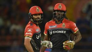 Royal Challengers Bangalore captain Virat Kohli (L) and cricketer Chris Gayle(AFP) Royal Challengers Bangalore captain Virat Kohli (L) and cricketer Chris Gayle(AFP)