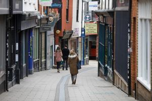 Pedestrians pass retail outlets on Lower Goat Lane in Norwich, UK on June 9, 2020.(Bloomberg) Pedestrians pass retail outlets on Lower Goat Lane in Norwich, UK on June 9, 2020.(Bloomberg)