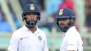 India's Rohit Sharma, right, and Cheteshwar Pujara(AP) India's Rohit Sharma, right, and Cheteshwar Pujara(AP)