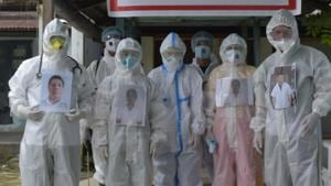 Doctors, nurses and attendants at Miao Covid-19 care centre in Changlang district of Arunachal Pradesh are seen with their photos pasted over PPE kits.(HT photo) Doctors, nurses and attendants at Miao Covid-19 care centre in Changlang district of Arunachal Pradesh are seen with their photos pasted over PPE kits.(HT photo)