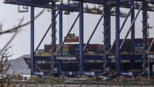 A gantry crane transports a shipping container at the Jawaharlal Nehru Port operated by Jawaharlal Nehru Port Trust (JNPT) in Navi Mumbai, Maharashtra on March 30, 2020.(Bloomberg File Photo) A gantry crane transports a shipping container at the Jawaharlal Nehru Port operated by Jawaharlal Nehru Port Trust (JNPT) in Navi Mumbai, Maharashtra on March 30, 2020.(Bloomberg File Photo)