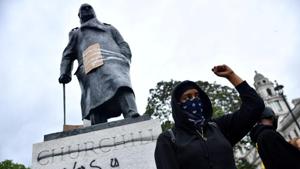 A demonstrator reacts infront of graffiti on a statue of Winston Churchill in Parliament Square during a Black Lives Matter protest in London following the death of George Floyd who died in police custody in Minneapolis, London on June 7, 2020.(Reuters File Photo) A demonstrator reacts infront of graffiti on a statue of Winston Churchill in Parliament Square during a Black Lives Matter protest in London following the death of George Floyd who died in police custody in Minneapolis, London on June 7, 2020.(Reuters File Photo)