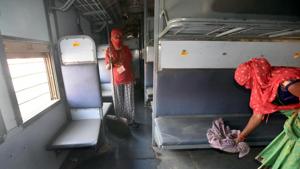 A train coach is cleaned while being converted into an isolation ward for Covid-19 patients, at Anand Vihar Railway Station in New Delhi.(Sonu Mehta/HT PHOTO) A train coach is cleaned while being converted into an isolation ward for Covid-19 patients, at Anand Vihar Railway Station in New Delhi.(Sonu Mehta/HT PHOTO)