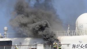 Smoke rises from Japanese cruise ship Asuka II docked in Yokohama Port, in Yokohama near Tokyo.(AP) Smoke rises from Japanese cruise ship Asuka II docked in Yokohama Port, in Yokohama near Tokyo.(AP)