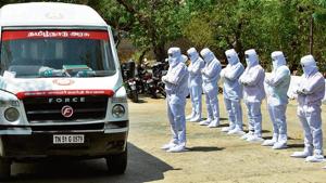 Volunteers offer funeral prayers in front of an ambulance carrying abandoned bodies of victims who died from the Covid-19 coronavirus at a graveyard in Chennai on June 16, 2020(AFP) Volunteers offer funeral prayers in front of an ambulance carrying abandoned bodies of victims who died from the Covid-19 coronavirus at a graveyard in Chennai on June 16, 2020(AFP)