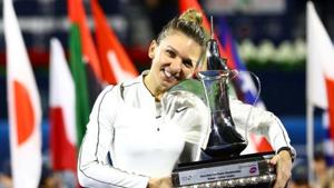 Romania's Simona Halep poses with a trophy as she celebrates after winning the final against Kazakhstan's Elena Rybakina(REUTERS) Romania's Simona Halep poses with a trophy as she celebrates after winning the final against Kazakhstan's Elena Rybakina(REUTERS)