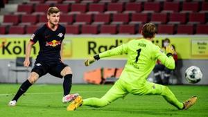 RB Leipzig's Timo Werner scores their third goal, as play resumes behind closed doors following the outbreak of the coronavirus disease (COVID-19).(REUTERS) RB Leipzig's Timo Werner scores their third goal, as play resumes behind closed doors following the outbreak of the coronavirus disease (COVID-19).(REUTERS)