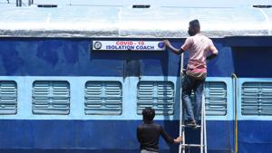 Railway staff preparing a train coach that is being turned into a Covid-19 isolation ward at Anand Vihar Railway Station in New Delhi.(Raj K Raj/HT PHOTO) Railway staff preparing a train coach that is being turned into a Covid-19 isolation ward at Anand Vihar Railway Station in New Delhi.(Raj K Raj/HT PHOTO)