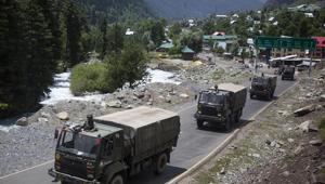 An Indian army convoy moves on the Srinagar- Ladakh highway at Gagangeer, north-east of Srinagar, India, Wednesday, June 17, 2020.(AP) An Indian army convoy moves on the Srinagar- Ladakh highway at Gagangeer, north-east of Srinagar, India, Wednesday, June 17, 2020.(AP)