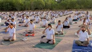 Bikaner: Police personnel practice yoga during the preparations ahead of International Yoga Day at police line parade ground, amid the ongoing COVID-19 lockdown, in Bikaner, Wednesday, June 17, 2020.(PTI) Bikaner: Police personnel practice yoga during the preparations ahead of International Yoga Day at police line parade ground, amid the ongoing COVID-19 lockdown, in Bikaner, Wednesday, June 17, 2020.(PTI)