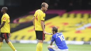 Leicester's James Maddison, right greets Watford's Craig Dawson after the English Premier League soccer match between Watford and Leicester CITY.(AP) Leicester's James Maddison, right greets Watford's Craig Dawson after the English Premier League soccer match between Watford and Leicester CITY.(AP)