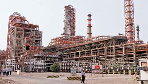 Workers walk inside the complex of the Vadinar refinery, operated by Essar Oil Ltd., (EOL) in the western Indian state of Gujarat(Reuters File Photo) Workers walk inside the complex of the Vadinar refinery, operated by Essar Oil Ltd., (EOL) in the western Indian state of Gujarat(Reuters File Photo)
