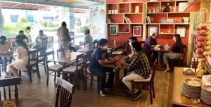 Customers at a cafe at Elante Mall in Chandigarh on Saturday.(HT Photo) Customers at a cafe at Elante Mall in Chandigarh on Saturday.(HT Photo)