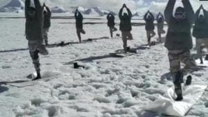 ITBP (Indo-Tibetan Border Police) personnel perform yoga at an altitude of 18000 feet in sub-zero temperatures.(ANI) ITBP (Indo-Tibetan Border Police) personnel perform yoga at an altitude of 18000 feet in sub-zero temperatures.(ANI)