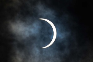 The solar eclipse seen through a cloud cover in New Delhi.(Sanchit Khanna/HT PHOTO) The solar eclipse seen through a cloud cover in New Delhi.(Sanchit Khanna/HT PHOTO)