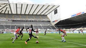 Newcastle United's Allan Saint-Maximin in aciton, as play resumes behind closed doors.(REUTERS) Newcastle United's Allan Saint-Maximin in aciton, as play resumes behind closed doors.(REUTERS)