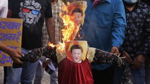 Indians burn an effigy of Chinese President Xi Jinping during a protest against China in Ahmedabad.(AP) Indians burn an effigy of Chinese President Xi Jinping during a protest against China in Ahmedabad.(AP)