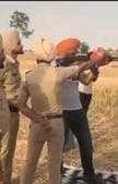 A grab from a video shared on social media recently of Punjabi singer Sidhu Moose Wala learning to fire at a shooting range at Badbar village in Barnala district.(HT PHOTO)