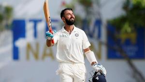India's cricketer Cheteshwar Pujara celebrates his century.(REUTERS) India's cricketer Cheteshwar Pujara celebrates his century.(REUTERS)