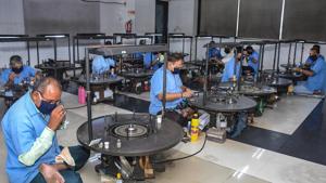 Diamond workers start their work at the manufacturing unit of Dharmanandan Diamonds after announcement of some relaxations during Covid-19 lockdown in Surat on May 20, 2020.(PTI File Photo) Diamond workers start their work at the manufacturing unit of Dharmanandan Diamonds after announcement of some relaxations during Covid-19 lockdown in Surat on May 20, 2020.(PTI File Photo)