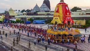 Priests and policemen pull the three chariots of Lord Jagannath, Balarama, and Subhadra from the construction site (Ratha Khala) to Jagannatha Temple for the annual Rath Yatra.(PTI Photo) Priests and policemen pull the three chariots of Lord Jagannath, Balarama, and Subhadra from the construction site (Ratha Khala) to Jagannatha Temple for the annual Rath Yatra.(PTI Photo)