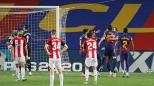 Barcelona's Ivan Rakitic celebrates scoring their first goal with teammates, as play resumes behind closed doors following the outbreak of the coronavirus disease (COVID-19).(REUTERS) Barcelona's Ivan Rakitic celebrates scoring their first goal with teammates, as play resumes behind closed doors following the outbreak of the coronavirus disease (COVID-19).(REUTERS)