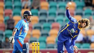 Sachin-Tendulkar-L-watches-as-Sri-Lankan-paceman-Lasith-Malinga-R-sends-down-a-delivery-in-their-international-one-day-cricket-match-played-in-Hobart-AFP-Photo-William-West(AFP) Sachin-Tendulkar-L-watches-as-Sri-Lankan-paceman-Lasith-Malinga-R-sends-down-a-delivery-in-their-international-one-day-cricket-match-played-in-Hobart-AFP-Photo-William-West(AFP)