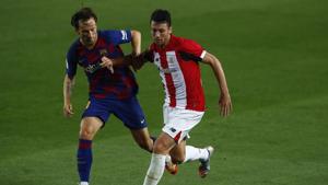 Barcelona's Ivan Rakitic, left, vies for the ball with Athletic Bilbao's Mikel San Jose during the Spanish La Liga soccer match between FC Barcelona and Athletic Bilbao at the Camp Nou stadium in Barcelona, Spain, Tuesday, June 23, 2020.(AP) Barcelona's Ivan Rakitic, left, vies for the ball with Athletic Bilbao's Mikel San Jose during the Spanish La Liga soccer match between FC Barcelona and Athletic Bilbao at the Camp Nou stadium in Barcelona, Spain, Tuesday, June 23, 2020.(AP)
