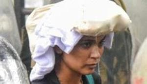 Activist Rehana Fathima being escorted by the police during her unsuccessful trek to the Sabarimala Temple in Kerala in October 2018.(PTI FILE PHOTO) Activist Rehana Fathima being escorted by the police during her unsuccessful trek to the Sabarimala Temple in Kerala in October 2018.(PTI FILE PHOTO)