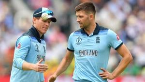 England's captain Eoin Morgan (L) speaks with teammate England's Mark Wood(AFP) England's captain Eoin Morgan (L) speaks with teammate England's Mark Wood(AFP)