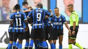 Soccer Football - Serie A - Inter Milan v U.S. Sassuolo - San Siro, Milan, Italy - June 24, 2020 Inter Milan's Cristiano Biraghi celebrates scoring their second goal with Alexis Sanchez and teammates.(REUTERS) Soccer Football - Serie A - Inter Milan v U.S. Sassuolo - San Siro, Milan, Italy - June 24, 2020 Inter Milan's Cristiano Biraghi celebrates scoring their second goal with Alexis Sanchez and teammates.(REUTERS)