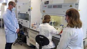 Britain's Prince William, left, wears a mask as he meets scientist Christina Dold, right, during a visit to the manufacturing laboratory where a vaccine against COVID-19 has been produced, at the Oxford Vaccine Group's facility at the Churchill Hospital in Oxford, England, Wednesday, June 24, 2020.(AP) Britain's Prince William, left, wears a mask as he meets scientist Christina Dold, right, during a visit to the manufacturing laboratory where a vaccine against COVID-19 has been produced, at the Oxford Vaccine Group's facility at the Churchill Hospital in Oxford, England, Wednesday, June 24, 2020.(AP)