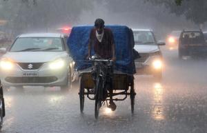 Commuters were forced to switch on their headlights as dark clouds brought in the monsoon rain at Phase 11 in Mohali on Wednesday.(Gurminder Singh/HT) Commuters were forced to switch on their headlights as dark clouds brought in the monsoon rain at Phase 11 in Mohali on Wednesday.(Gurminder Singh/HT)