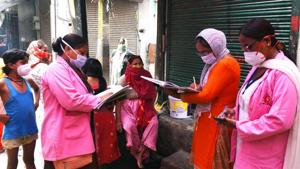 Volunteers conducting door to door survey to detect Covid-19 symptomatic cases at Nabi Karim in New Delhi.(HT PHoto/Raj K Raj) Volunteers conducting door to door survey to detect Covid-19 symptomatic cases at Nabi Karim in New Delhi.(HT PHoto/Raj K Raj)