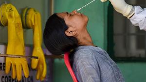 A health worker collects a girl’s sample in Chennai for COVID-19 test(PTI Photo) A health worker collects a girl’s sample in Chennai for COVID-19 test(PTI Photo)