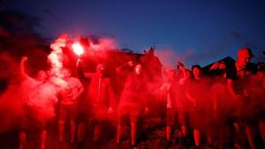 Liverpool fans celebrate with flares outside Anfield after Chelsea scored their second goal in their match against Manchester City(REUTERS) Liverpool fans celebrate with flares outside Anfield after Chelsea scored their second goal in their match against Manchester City(REUTERS)
