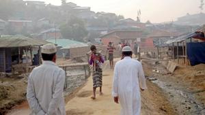 Rohingya refugees walk on a road at the Balukhali camp in Cox's Bazar, Bangladesh.(REUTERS/For Representative Purposes Only) Rohingya refugees walk on a road at the Balukhali camp in Cox's Bazar, Bangladesh.(REUTERS/For Representative Purposes Only)